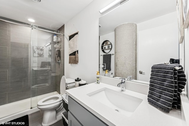 3963 W Belmont Ave Unit 140, Chicago, IL 60618 - bathroom featuring toilet, vanity, and a shower stall