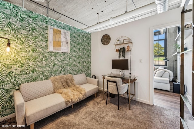 3963 W Belmont Ave Unit 140, Chicago, IL 60618 - carpeted home office with wallpapered walls, baseboards, and an accent wall