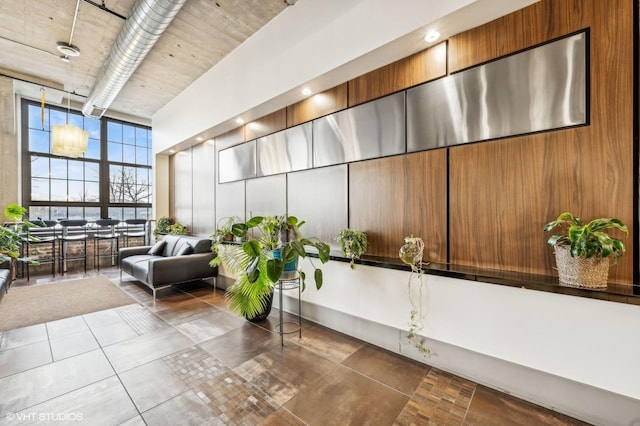 3963 W Belmont Ave Unit 140, Chicago, IL 60618 - community lobby with floor to ceiling windows and a towering ceiling