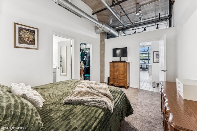 3963 W Belmont Ave Unit 140, Chicago, IL 60618 - bedroom with carpet floors, a spacious closet, a towering ceiling, and a closet
