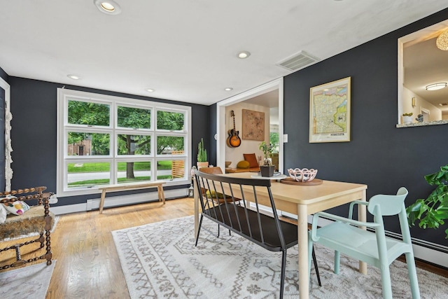 324 W Crystal Lake Ave, Crystal Lake, IL 60014 - dining area featuring wood finished floors, recessed lighting, a baseboard heating unit, and baseboards