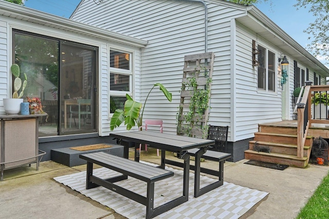 324 W Crystal Lake Ave, Crystal Lake, IL 60014 - deck featuring a patio area and outdoor dining area