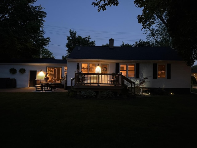 324 W Crystal Lake Ave, Crystal Lake, IL 60014 - back of house with a chimney and a deck