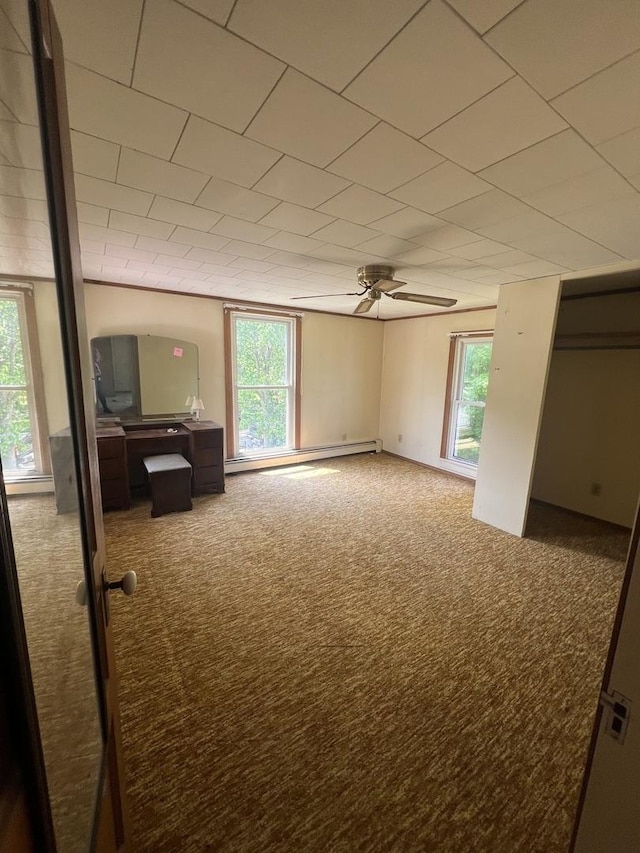 202 W Fourth St, Leaf River, IL 61047 - spare room with carpet floors, ceiling fan, and an office area