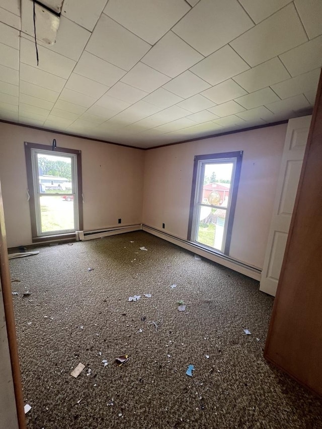 202 W Fourth St, Leaf River, IL 61047 - unfurnished room featuring baseboards