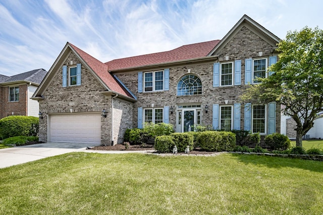 3744 Highknob Cir, Naperville, IL 60564 - view of front of house with brick siding, an attached garage, concrete driveway, a front lawn, and a shingled roof
