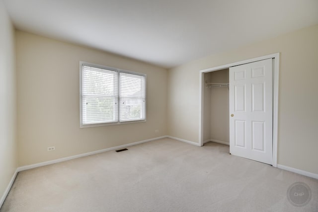 3744 Highknob Cir, Naperville, IL 60564 - unfurnished bedroom featuring light colored carpet, baseboards, and a closet