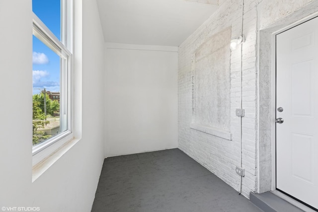 157 N Leamington Ave, Chicago, IL 60644 - unfurnished room featuring concrete floors