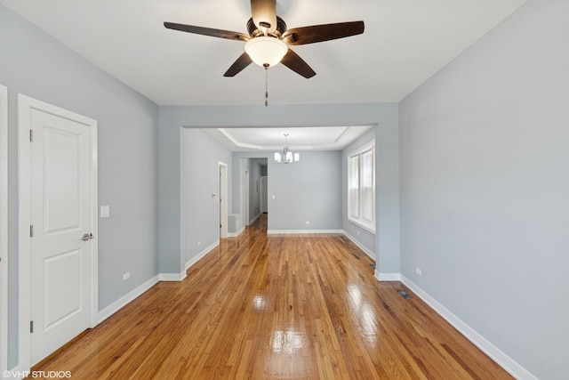 157 N Leamington Ave, Chicago, IL 60644 - spare room with a chandelier, light wood-style flooring, and ceiling fan