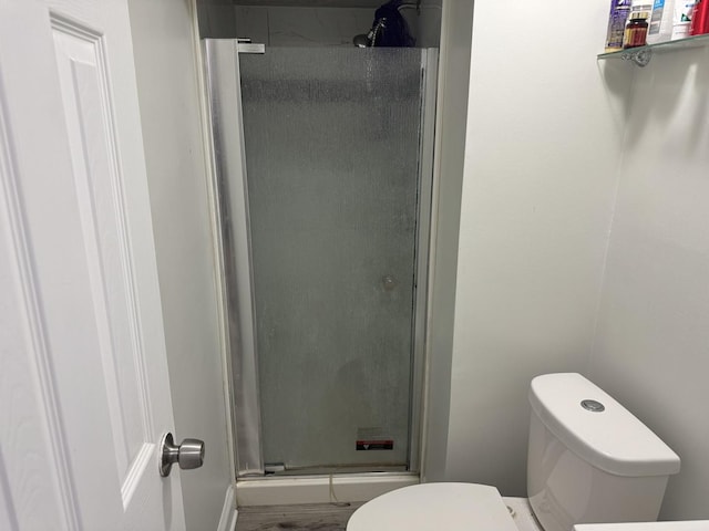 11540 S Racine Ave, Chicago, IL 60643 - bathroom featuring toilet, a stall shower, and wood finished floors
