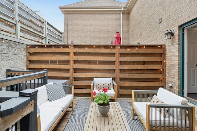 1248 W Fletcher St Unit C, Chicago, IL 60657 - wooden deck featuring an outdoor hangout area