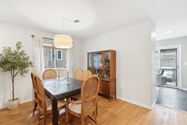 1248 W Fletcher St Unit C, Chicago, IL 60657 - dining space featuring plenty of natural light, baseboards, and light wood-style floors