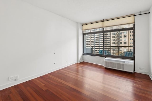 1430 N Astor St Unit 11C, Chicago, IL 60610 - unfurnished room with wood finished floors, baseboards, and radiator heating unit