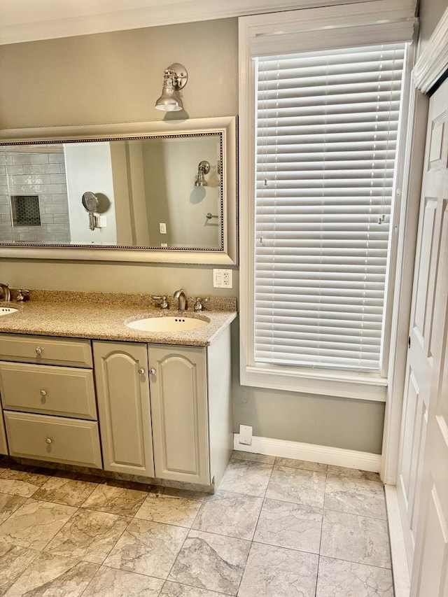 4118 N Kedzie Ave, Chicago, IL 60618 - full bathroom featuring baseboards, double vanity, crown molding, and marble finish floors