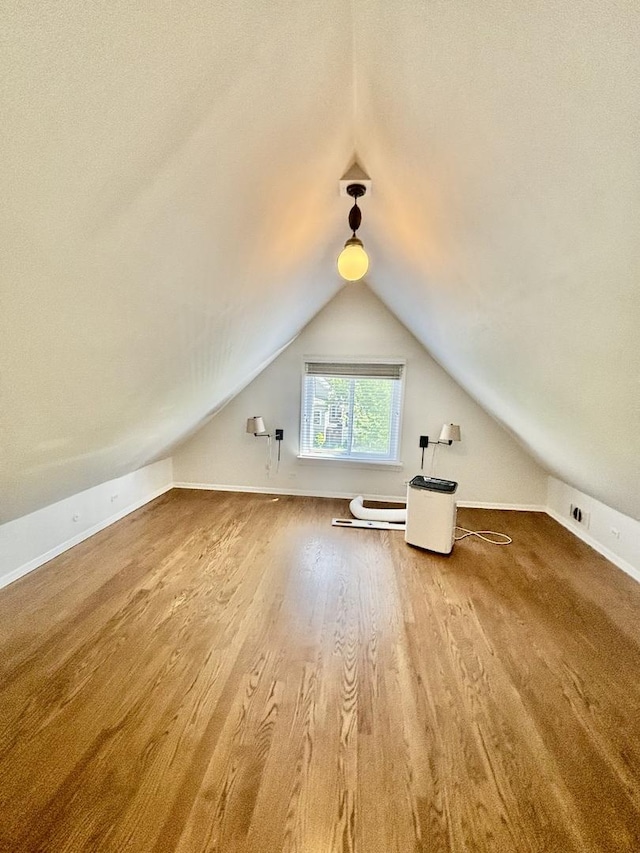 4118 N Kedzie Ave, Chicago, IL 60618 - additional living space with wood finished floors, vaulted ceiling, and baseboards