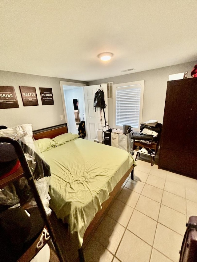 4118 N Kedzie Ave, Chicago, IL 60618 - bedroom featuring light tile patterned floors