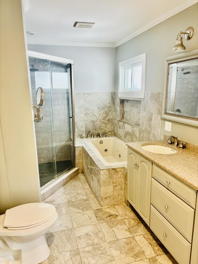 4118 N Kedzie Ave, Chicago, IL 60618 - bathroom with a tub with jets, vanity, a stall shower, crown molding, and toilet