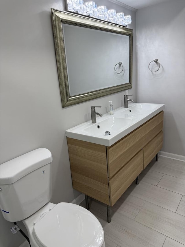 9B Kingery Quarter Unit 108, Willowbrook, IL 60527 - bathroom featuring double vanity and toilet