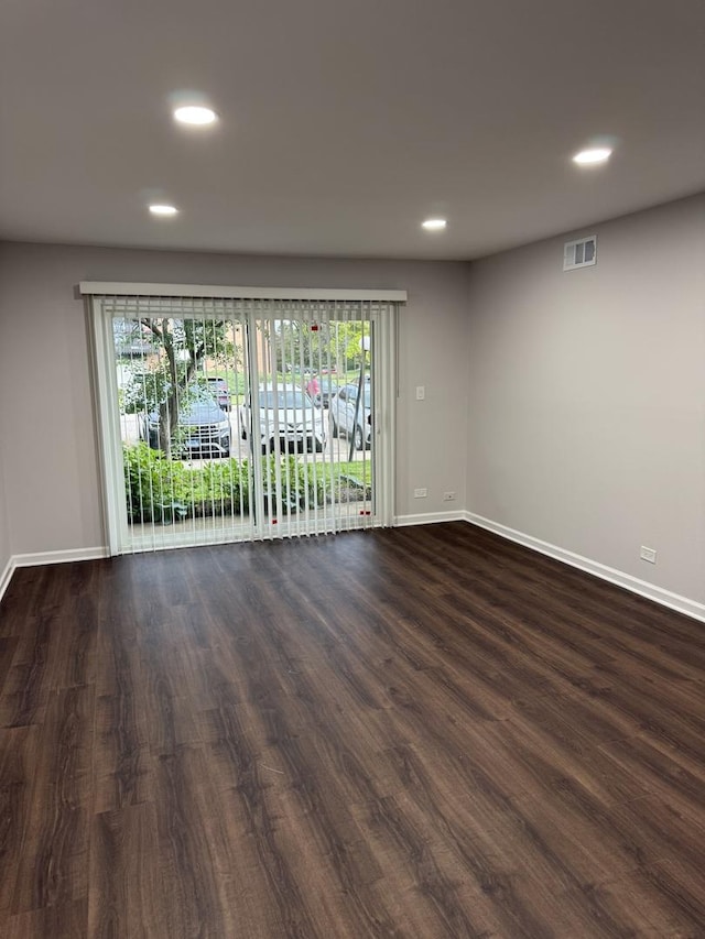 9B Kingery Quarter Unit 108, Willowbrook, IL 60527 - unfurnished room featuring healthy amount of natural light, recessed lighting, and dark wood-type flooring