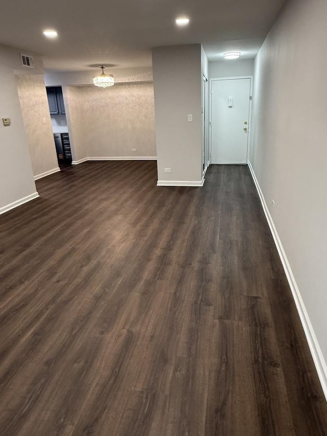 9B Kingery Quarter Unit 108, Willowbrook, IL 60527 - unfurnished living room with dark wood finished floors and recessed lighting