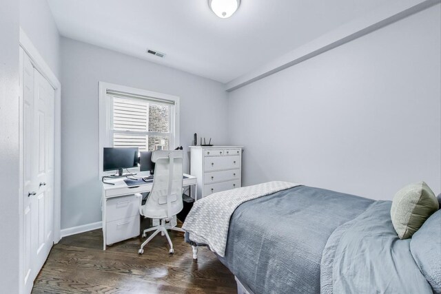1952 W Fletcher St Unit 2W, Chicago, IL 60657 - bedroom with dark wood finished floors, an office area, and a closet