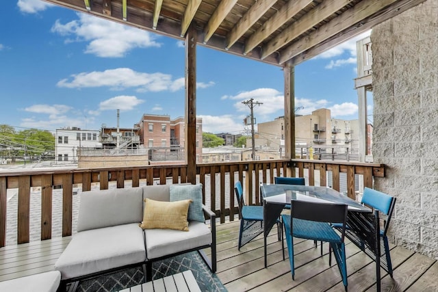 1952 W Fletcher St Unit 2W, Chicago, IL 60657 - wooden deck featuring outdoor dining space