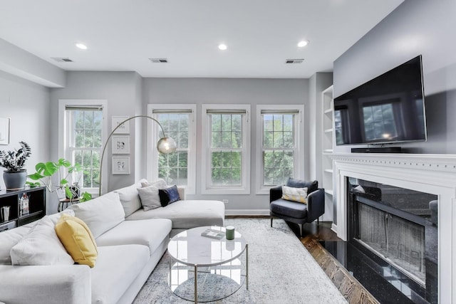 1952 W Fletcher St Unit 2W, Chicago, IL 60657 - living room with wood finished floors, a premium fireplace, recessed lighting, and baseboards