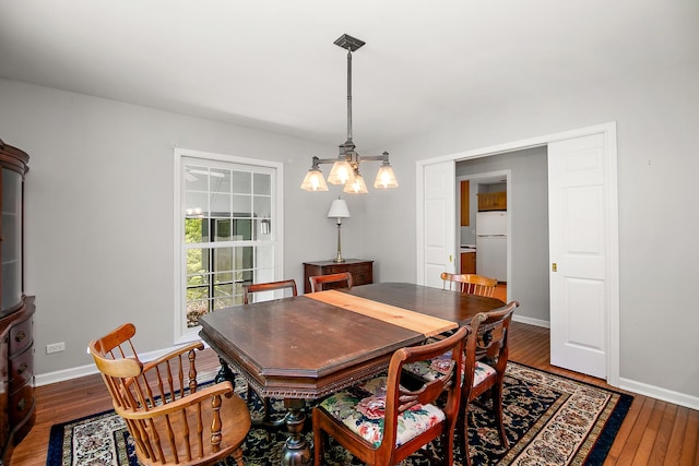 16864 E State Route 17, Grant Park, IL 60940 - dining room featuring hardwood / wood-style flooring, a chandelier, and baseboards