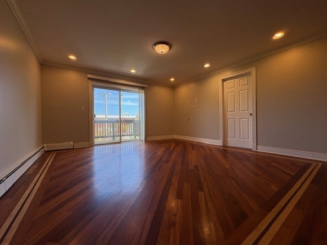 8232 Niles Center Rd Unit 317, Skokie, IL 60077 - unfurnished room featuring ornamental molding, wood finished floors, a baseboard heating unit, baseboards, and recessed lighting