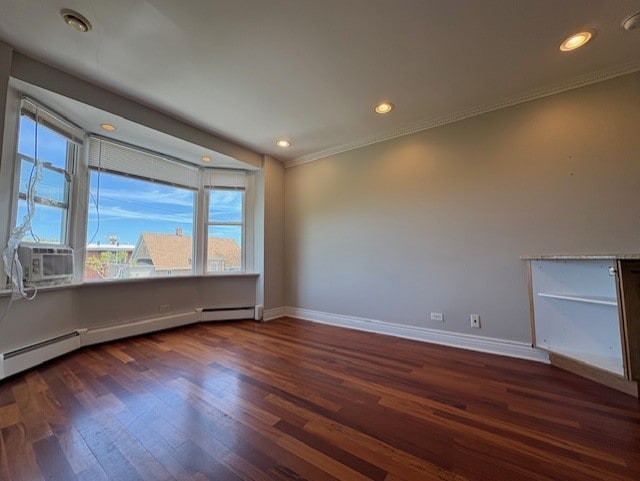 8232 Niles Center Rd Unit 317, Skokie, IL 60077 - spare room with healthy amount of natural light, baseboards, wood finished floors, ornamental molding, and recessed lighting