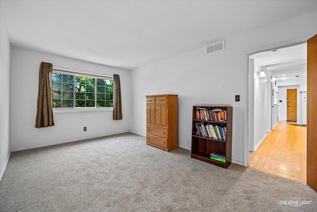 1120 N Farnsworth Ave Unit 2C, Aurora, IL 60505 - empty room with carpet and baseboards
