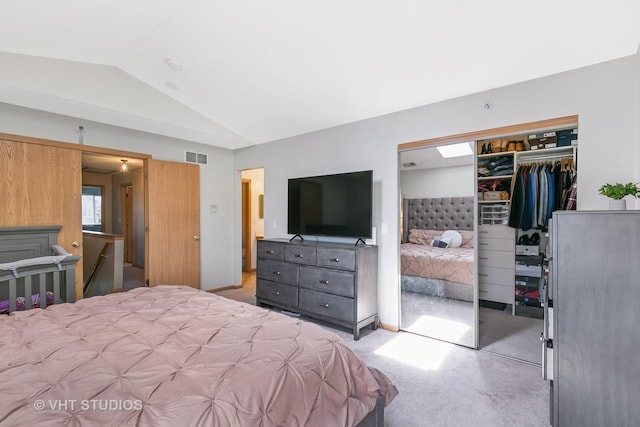 6417 Blue Sky Ln, Matteson, IL 60443 - bedroom featuring lofted ceiling, light colored carpet, and a closet
