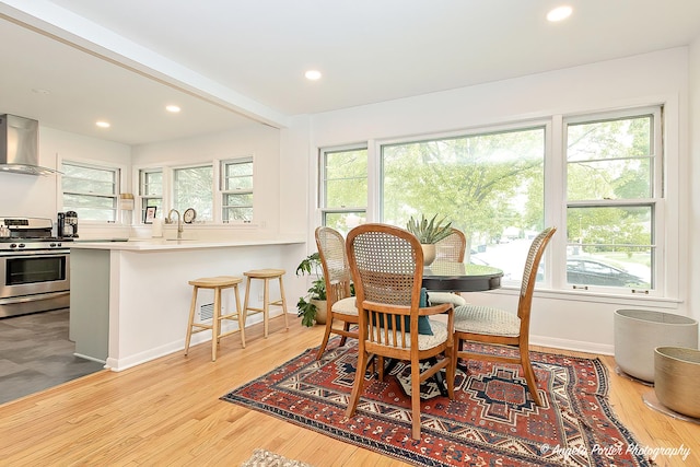 10067 Lavergne Ave, Skokie, IL 60077 - dining area with light wood-style floors, recessed lighting, and baseboards
