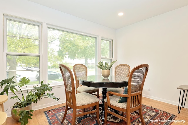 10067 Lavergne Ave, Skokie, IL 60077 - dining room with baseboards, light wood-style floors, and recessed lighting