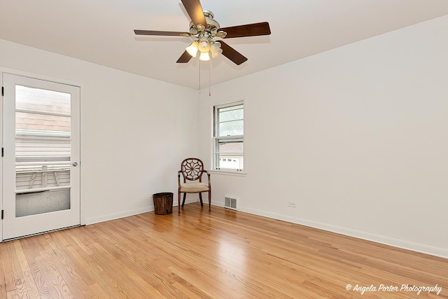 10067 Lavergne Ave, Skokie, IL 60077 - unfurnished room with light wood finished floors, ceiling fan, and baseboards