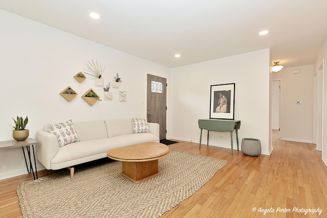 10067 Lavergne Ave, Skokie, IL 60077 - living room featuring light wood finished floors, recessed lighting, and baseboards