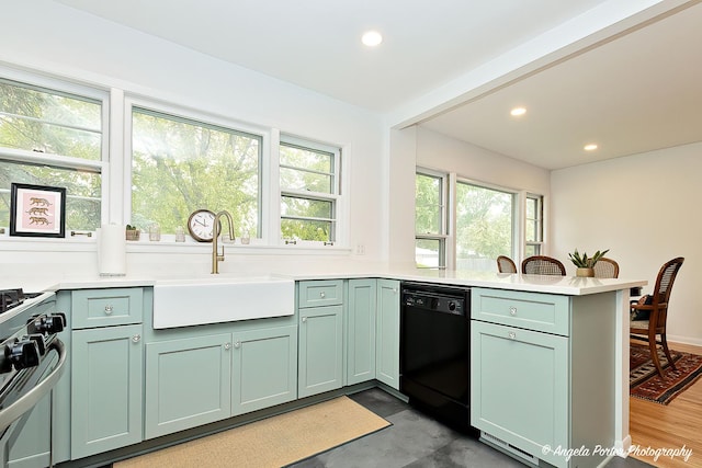 10067 Lavergne Ave, Skokie, IL 60077 - kitchen featuring dishwasher, green cabinetry, a peninsula, gas range, and a sink