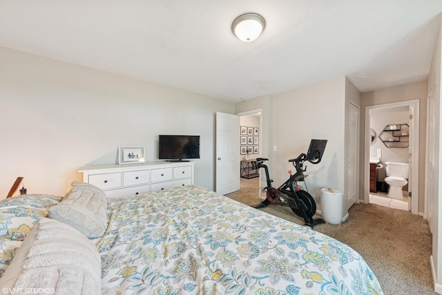 2109 Sprucewood Ln, Lindenhurst, IL 60046 - carpeted bedroom with ensuite bathroom and baseboards