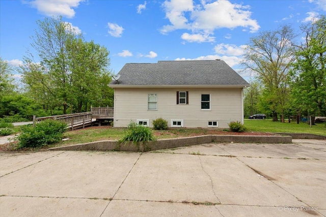 119 W S Ave, Spring Grove, IL 60081 - view of property exterior with a wooden deck, a patio area, and a yard