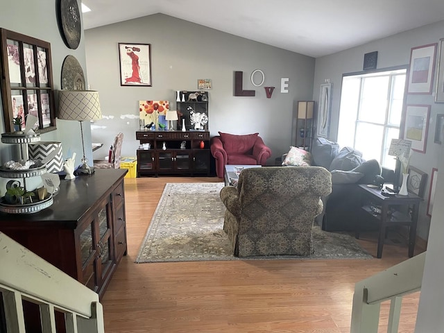30W071 Kensington Dr, Warrenville, IL 60555 - living room featuring wood finished floors and vaulted ceiling