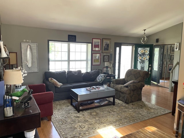 30W071 Kensington Dr, Warrenville, IL 60555 - living area featuring wood finished floors and lofted ceiling