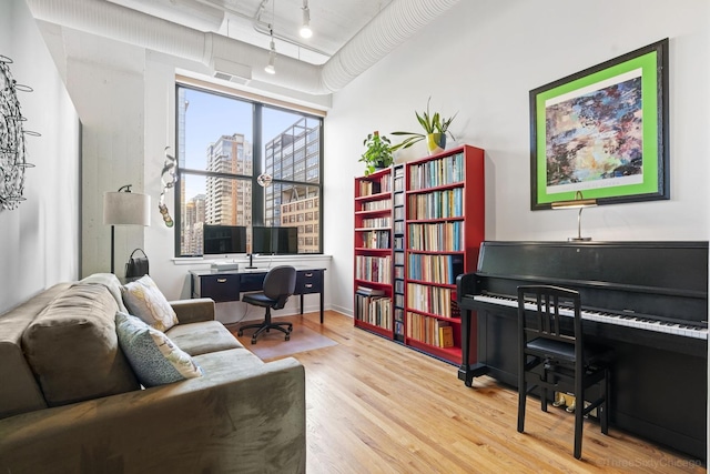 547 S Clark St Unit 704, Chicago, IL 60605 - office area with wood finished floors, a city view, and rail lighting