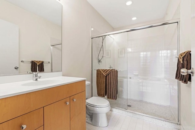 547 S Clark St Unit 704, Chicago, IL 60605 - bathroom with toilet, tile patterned floors, vanity, a shower stall, and recessed lighting