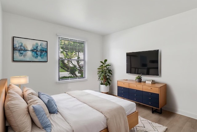 266 Mayfair Ln Unit C1, Schaumburg, IL 60193 - bedroom with light wood finished floors and baseboards