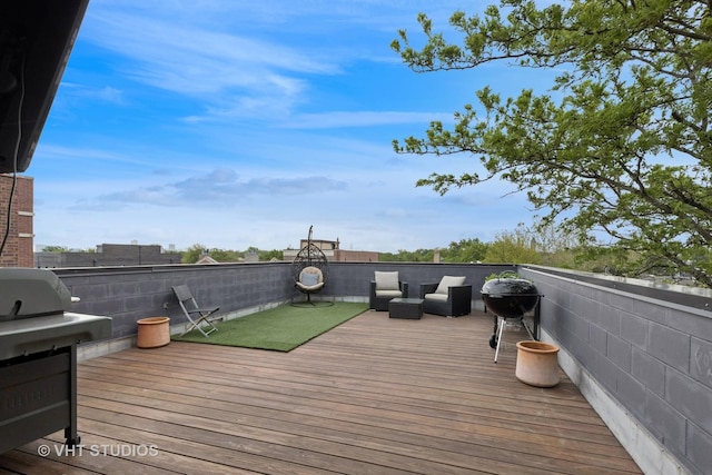2256 W Foster Ave Unit 3, Chicago, IL 60625 - wooden deck featuring a grill