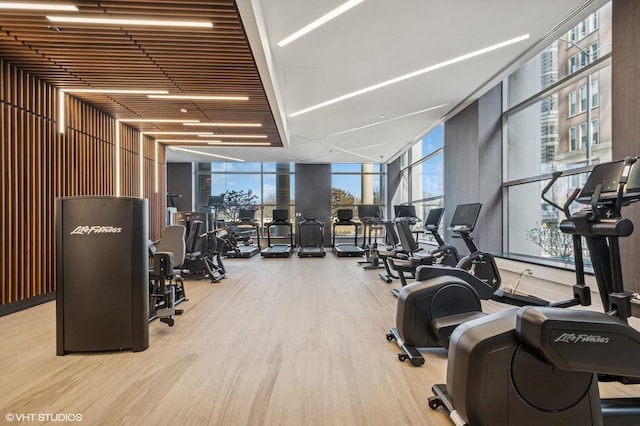 600 N Lake Shore Dr Unit 3411, Chicago, IL 60611 - exercise room featuring expansive windows, wood finished floors, and plenty of natural light