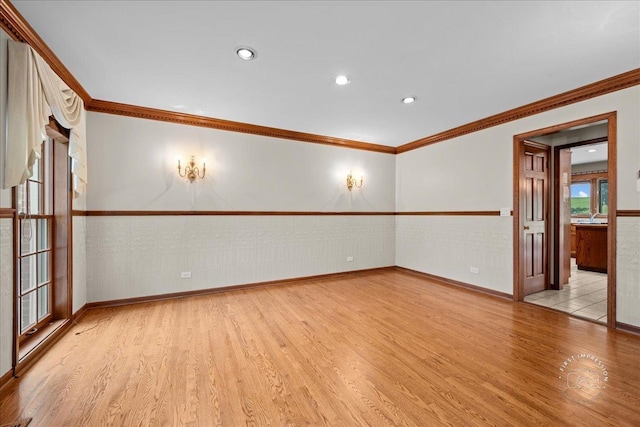 560 Braemar Ave, Naperville, IL 60563 - unfurnished room featuring light wood finished floors, a wainscoted wall, crown molding, and recessed lighting