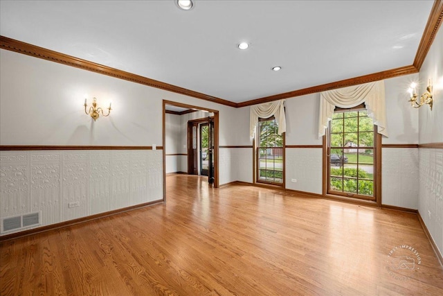 560 Braemar Ave, Naperville, IL 60563 - empty room with ornamental molding, plenty of natural light, wood finished floors, and recessed lighting