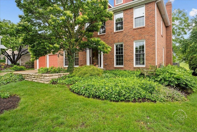 560 Braemar Ave, Naperville, IL 60563 - view of front of property with brick siding, a front yard, an attached garage, and a chimney
