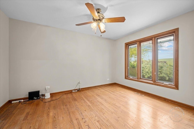 560 Braemar Ave, Naperville, IL 60563 - unfurnished room featuring wood finished floors and ceiling fan